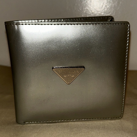 Prada Handbags - Prada Silver Bi-Fold Wallet Saffiano metallic leather. Hard color to find.